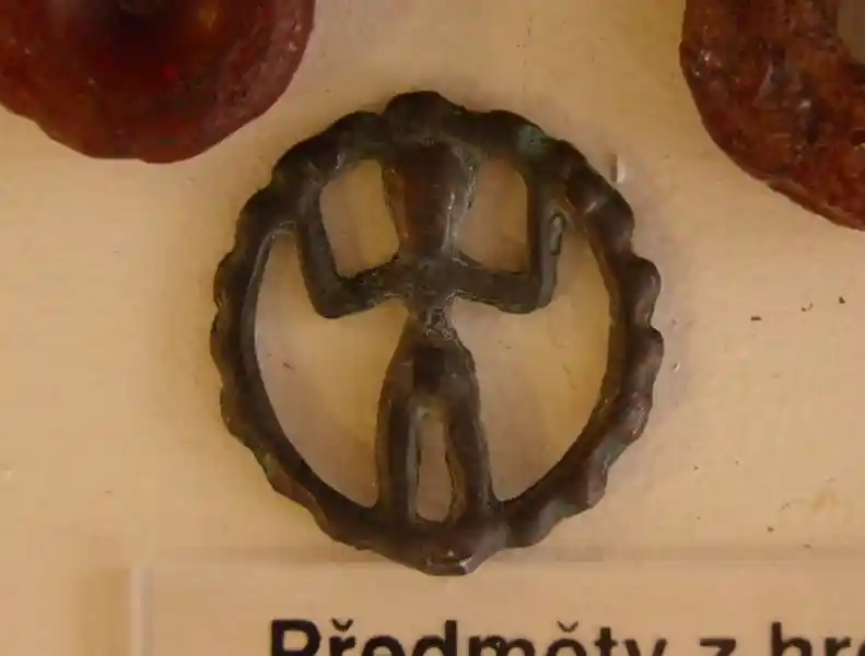 Figure of a man inside a circle that resembles the sun